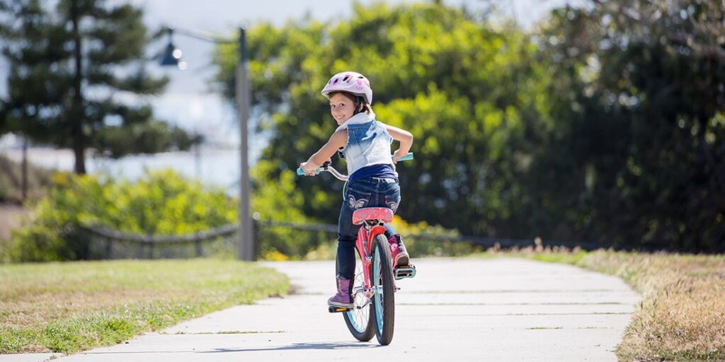 child on bike