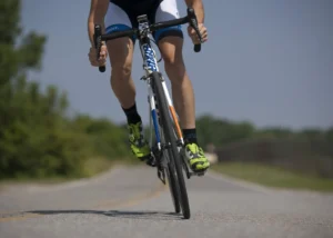 image of a man cycling